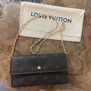 Louis Vuitton International trifold monogram wallet and bag